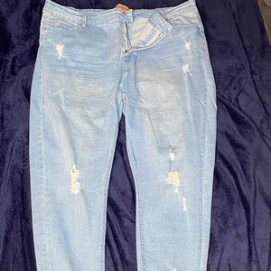 Distressed stretch jeans, tattered/distressed at the ankles